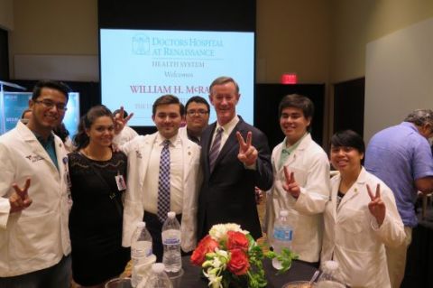 Flashing the “Vaquero” sign with a group of the new UTRGV med students