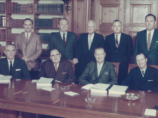 Seated (left to right) - W. W. Heath, Walter P. Brenan, French Robertson, J. P. Bryan: Standing (left to right) - Wales H. Madden, John S. Redditt, Thornton Hardie, H. Frank Connally, and A. G. McNeese, Jr.