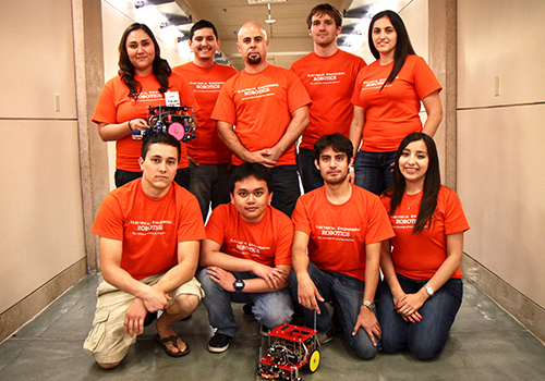 Dr. Mounir Ben Ghalia (pictured back center) with students, including Estrella Medina (pictured back left).