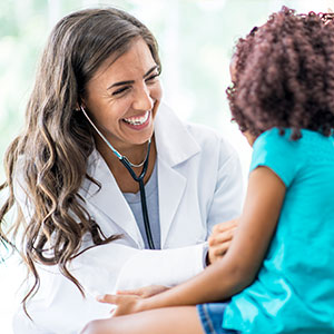 doctor treating child