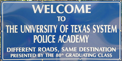 Location signage, text on sign: Welcome to the Police Academy sign