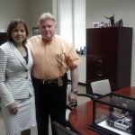 Director Heidingsfield presents a model UTSP vehicle to Vice Chancellor Randa Safady in appreciation for her making possible the UTSP Recruiting video