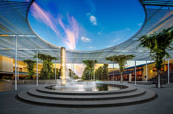 UT Dallas commons area with fountain, looking up through the architecture hole in the canopy