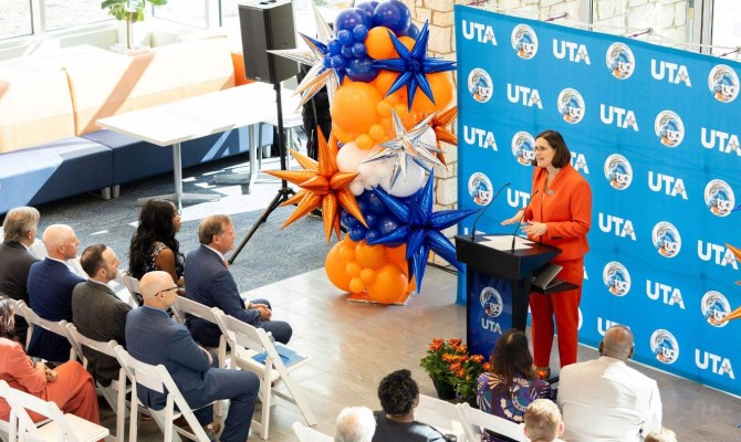 President Jennifer Cowley at the Maverick Hall ribbon-cutting