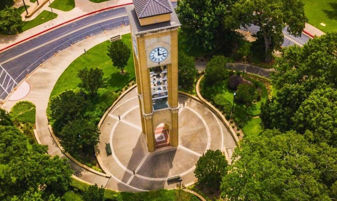 Areal shot of the UT Tyler clock tower looking down at it from the air
