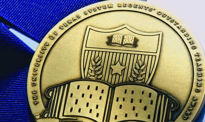 Regents Outstanding Teaching Awards Medal features the UT System shield and book.
