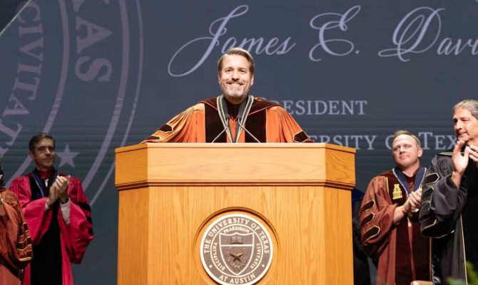 President Jim Davis at a podium giving a speech
