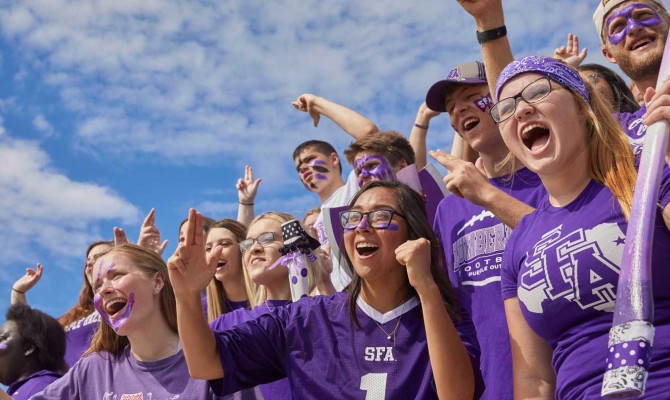 Stephen F Austin students cheering at a rally
