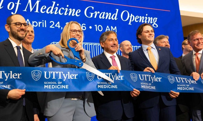 UT Tyler and UT System leadership pose for a photo during ribbon cutting
