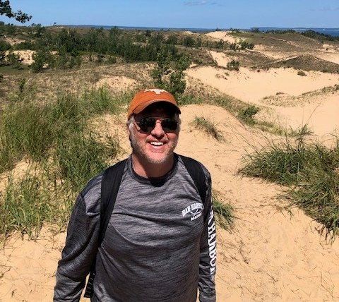 UT System's Vice Chancellor for Health Affairs and Chief Medical Officer Dr. David Lakey sports a UT Longhorns ball cap while out on a hike.