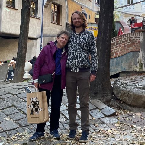 Rebecca Karoff stands with her son Jacob outside the Hundertwasser Museum in Vienna, Austria.
