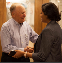 Archer Center founder Bill Archer speaks to Sherry Maximoss, a Fall 2015 Archer Fellow