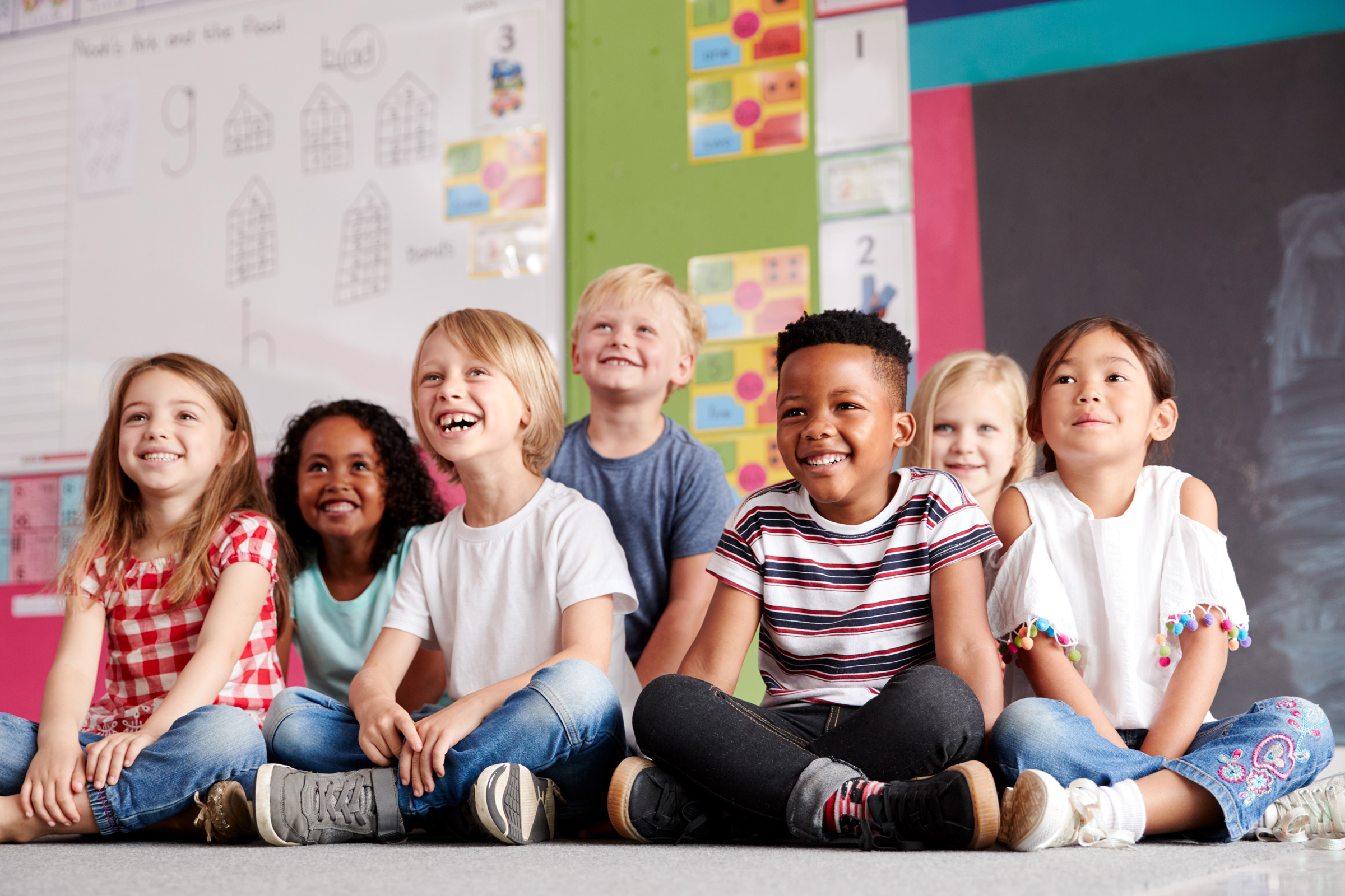 Children seated in a classroom